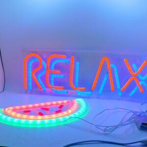 2 NEON SIGNS.  WATERMELON SIGN 11" LONG X 6" WIDE.AND RELAX SIGN  18" LONG X 6"